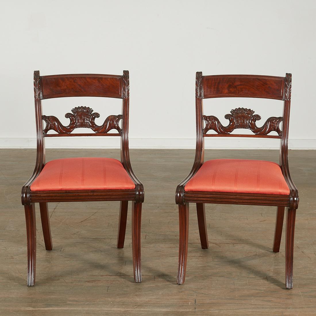 Pair American Classical Carved Mahogany Chairs: Pair American Classical Carved Mahogany Chairs, 19th c., New York, each with a paneled and leafy crestrail above a carved cornucopia splat, the drop-in seat with reeded apron and continuing to molded 