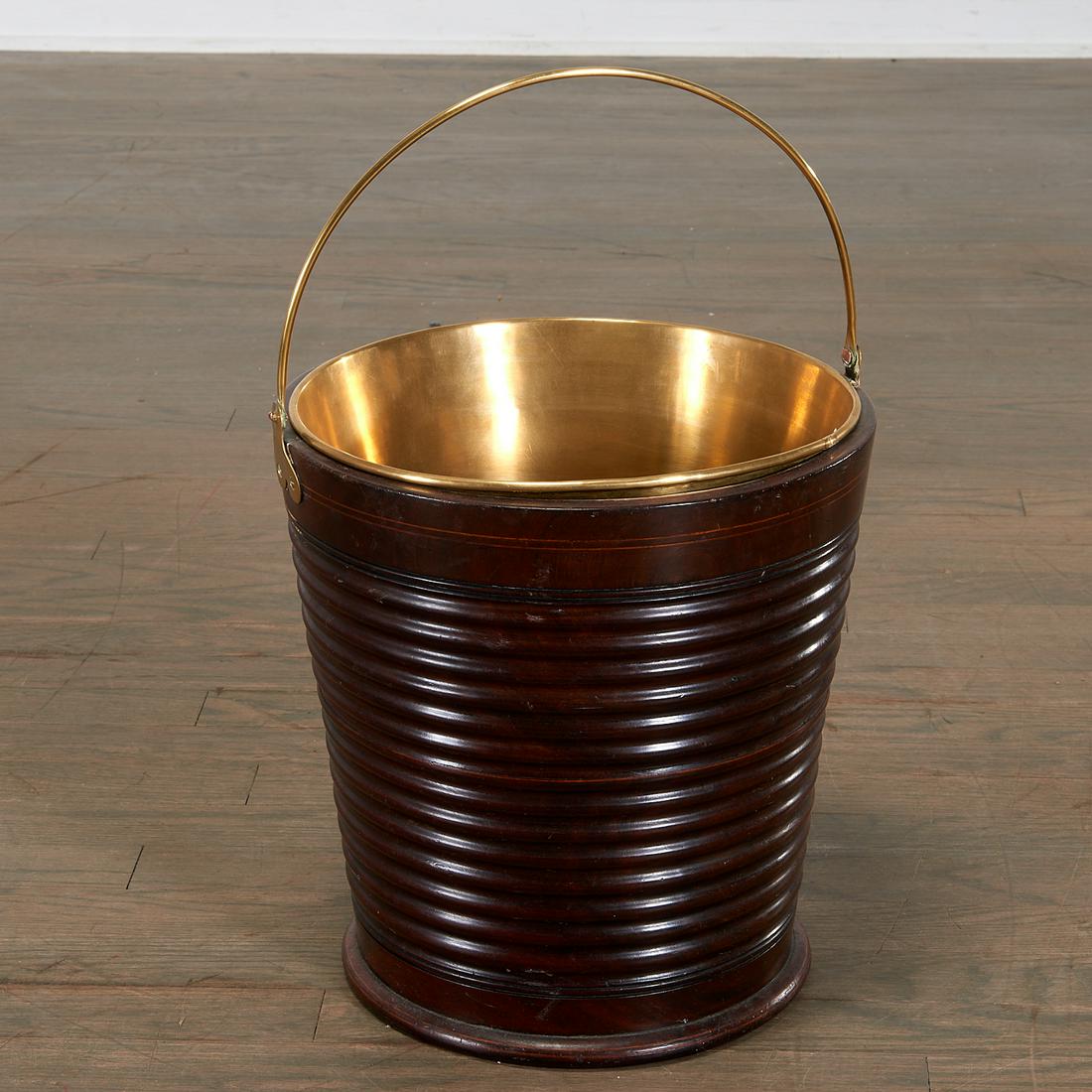 Late Georgian Mahogany Peat Bucket: Late Georgian Mahogany Peat Bucket, c. 1800, possibly Irish, tapering ring-turned body with brass liner and bail handle, 12" h Provenance: The Collection of Elizabeth "Betty" Seeler