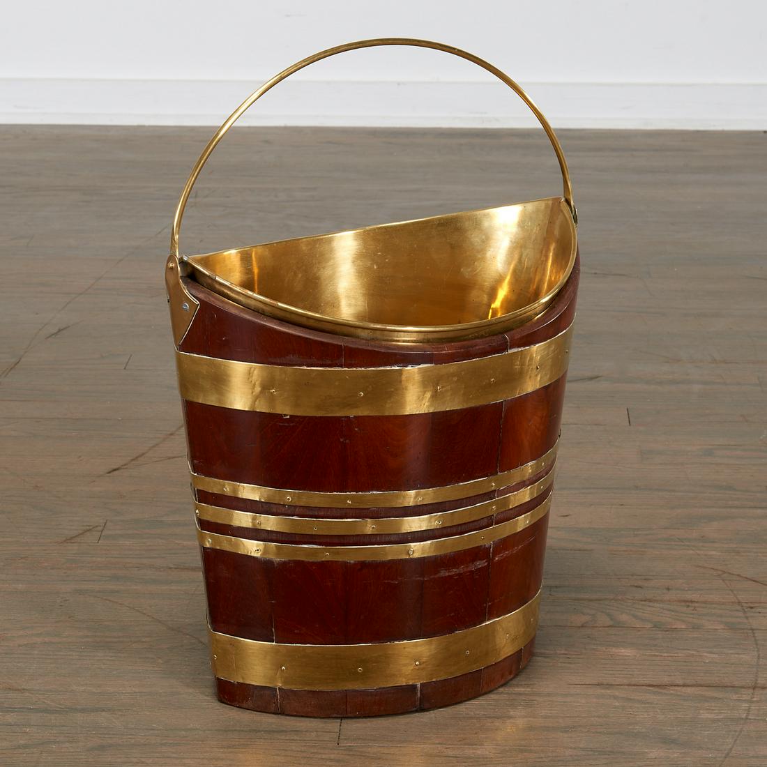 Georgian Brass-Bound Mahogany Peat Bucket: Georgian Brass-Bound Mahogany Peat Bucket, 19th c., of navette form, with brass liner and bale handle, 14" h x 14" w (excl handle) Provenance: The Collection of Elizabeth "Betty" Seeler