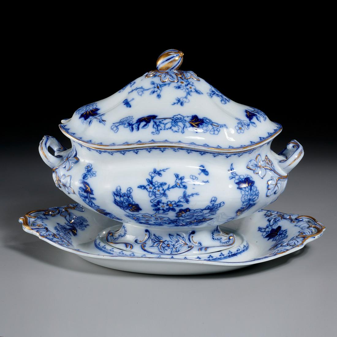 Copeland & Garret Soup Tureen and Stand: Copeland & Garret Soup Tureen and Stand, c. 1840, cream ground decorated with an all-over blue foliate ornamentation, factory marks, tureen: 12" h x 15" w, stand: 18" l Provenance: The Collection of E