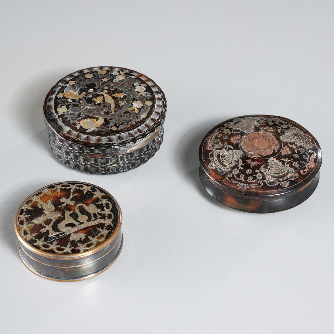 (3) English Metal Inlaid Snuff or Patch Boxes: (3) English Metal Inlaid Snuff or Patch Boxes, 19th c., including one with with engine-turned edge and silver and mother-of-pearl scrolls and birds, c. 1830, one with silver scroll, bird and animal de