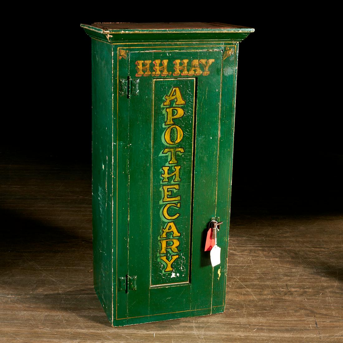 Antique Portland Maine painted apothecary cupboard: Antique Portland Maine painted apothecary cupboard, 19th/20th c., hand painted "H.H. Hay Apothecary" to door front, fixed interior shelves, latching hardware, 38.5"h x 18.75"w x 14"d Notes/Literature: