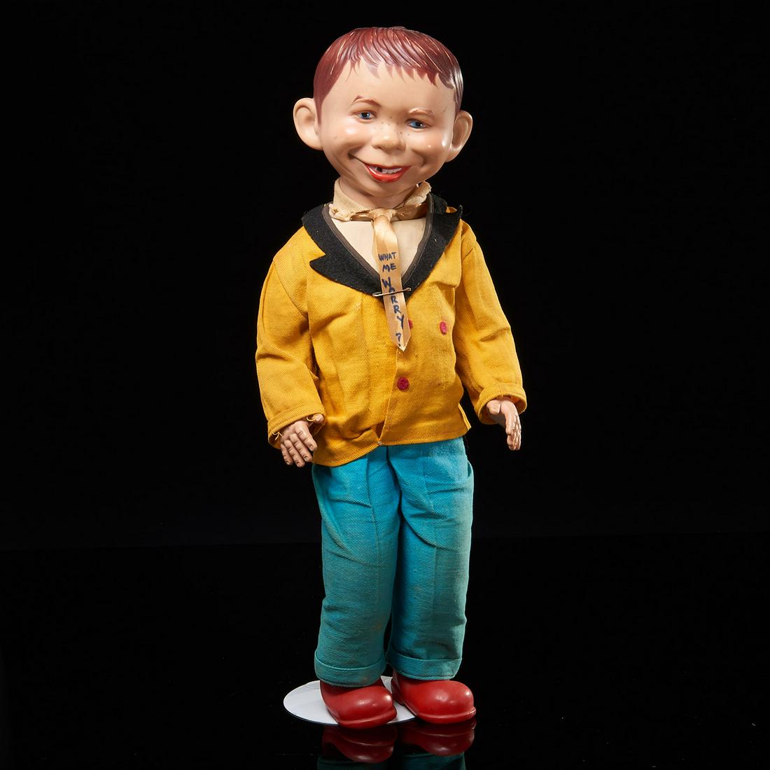 Mad Magazine, Alfred E. Neuman doll, 1961: Mad Magazine, Alfred E. Neuman doll, 1961, "What Me Worry", plastic doll model of Alfred E. Neuman, impressed manufacturer mark to back of head "Baby Barry, 1961", with doll stand, 19"h x 8"w x 4"d
