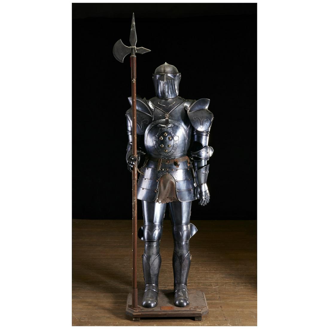 Kitschy life-size suit of armor drinks bar: Kitschy life-size suit of armor drinks bar, 20th c., tin, leather, wood and other materials on wood base, plaque on base reads "Armatura Italiana Sec XV", breastplate swings down on chains to reveal t