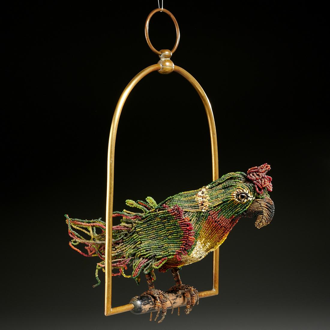 Antique Italian beaded perched parrot lamp: Antique Italian beaded perched parrot lamp, Early 20th c., glass beaded parrot on wire frame, with wood and brass perch, lacking the lighting fixture, 15.5"h (overall), 8"w