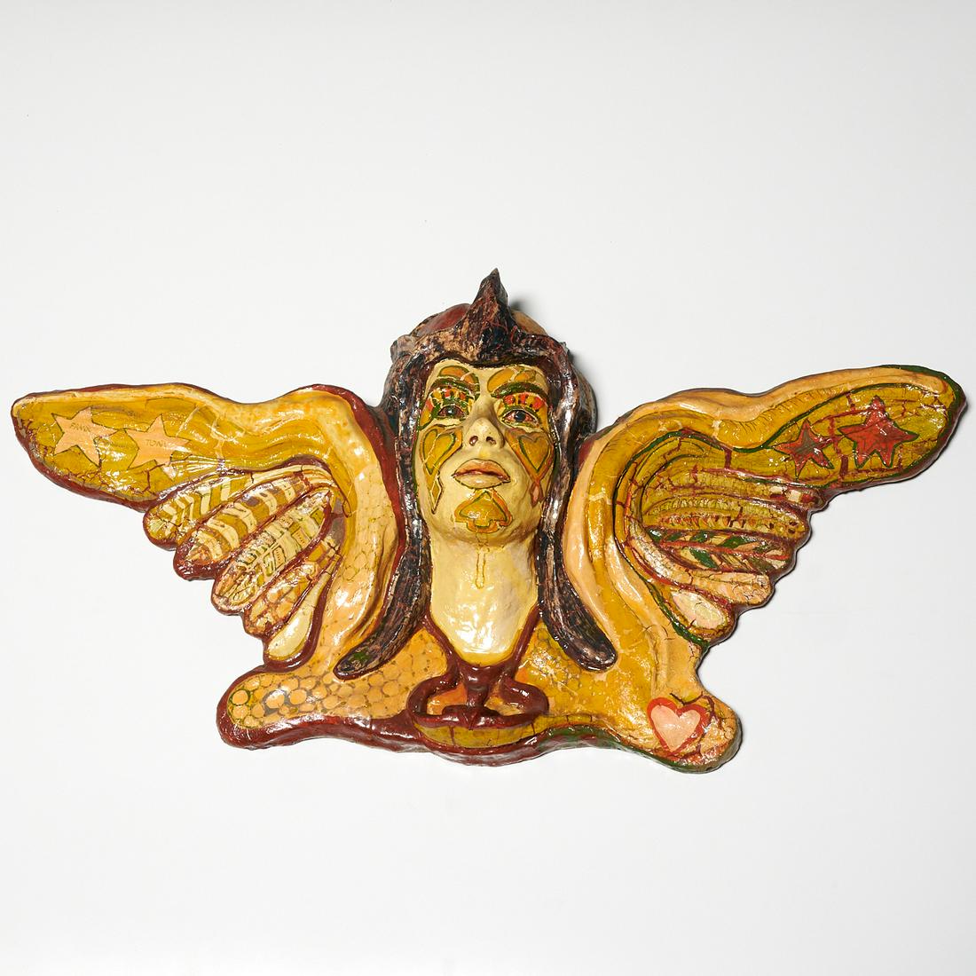 John Ziegenhagen, theatrical fantasy sculpture: John Ziegenhagen, theatrical fantasy sculpture, John Ziegenhagen (American, 20th c.), Winged mask, painted plaster and fiberglass on wood base, hanging loop on back, no signature observed, 20"h x 40"w