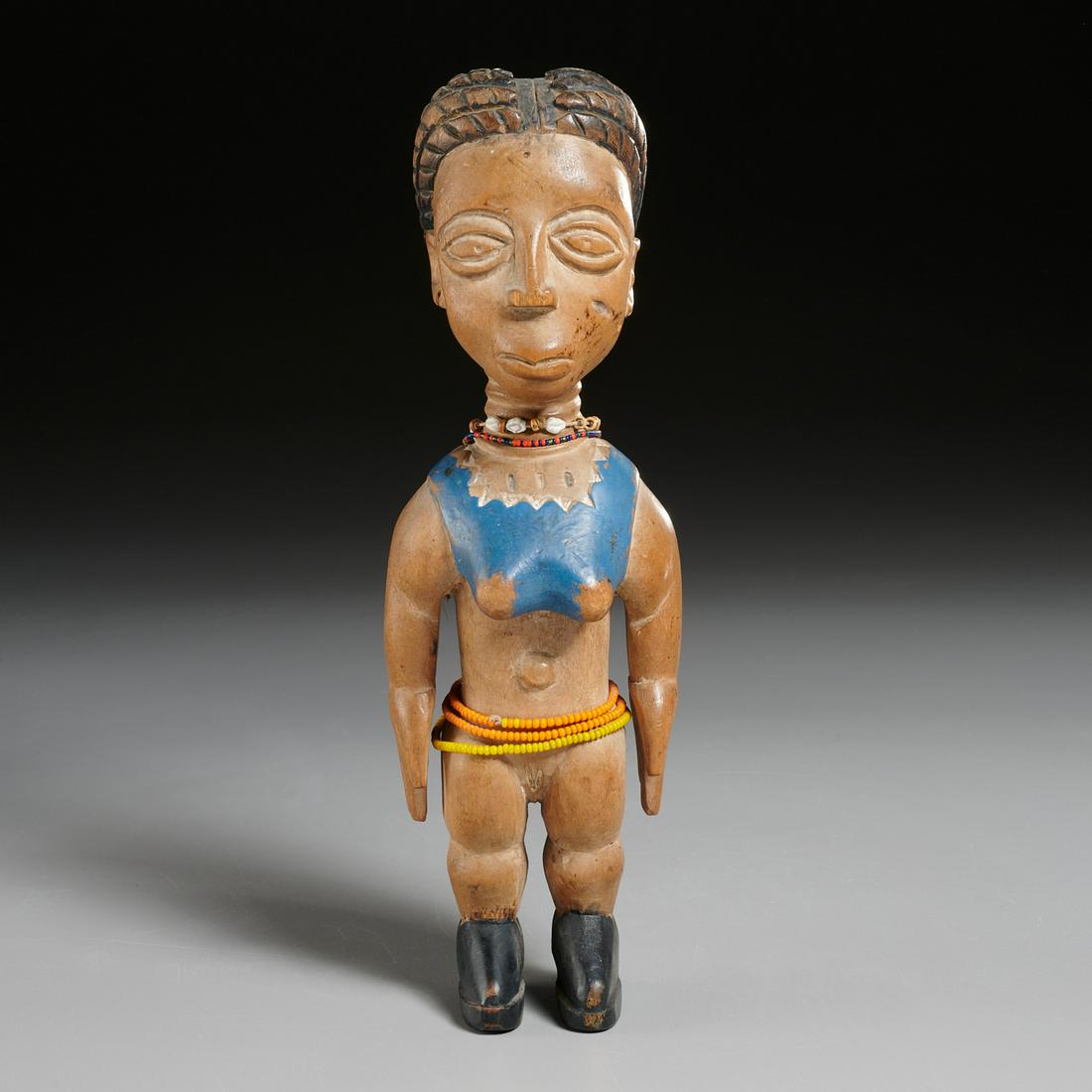 Yoruba Peoples, unusual Ere Ibeji female twin: Yoruba Peoples, unusual Ere Ibeji female twin, 20th c., Nigeria, carved wood with blue and black paint, strung beds, the rigid standing female figure with carved coiled hair and pronounced breasts, 12