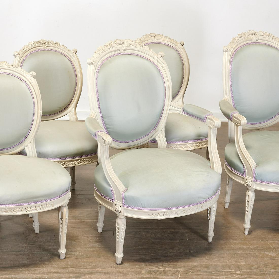 (6) Louis XVI chairs, ex. Marie Antoinette film: (6) Louis XVI chairs, ex. Marie Antoinette film, 18th/19th c., possibly Austrian or German, pale gray painted carved wood, incl. (2) amply proportioned open arm fauteuils and (4) side chairs, the fram