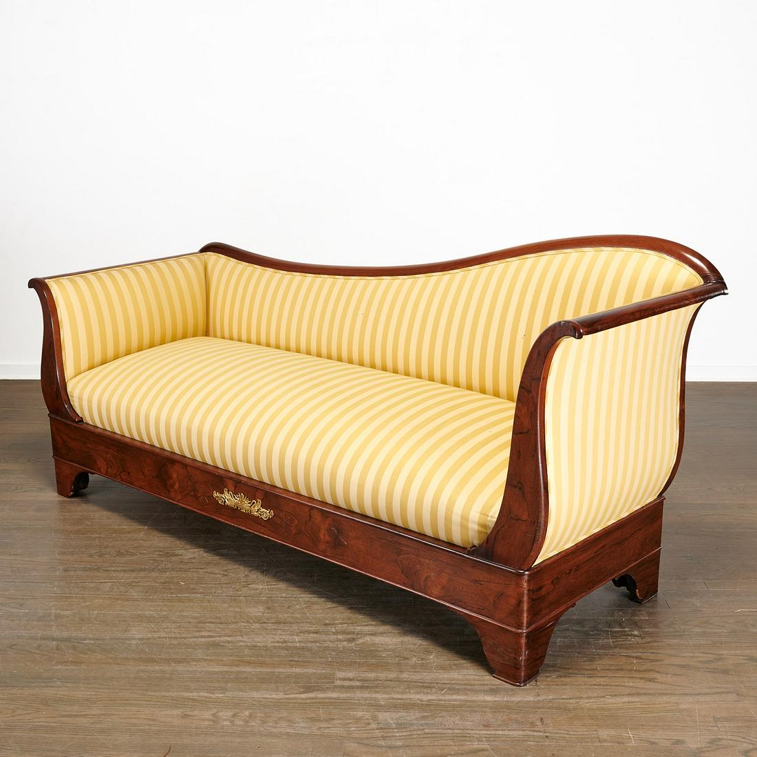 Empire bronze mounted recamier: Empire bronze mounted recamier, 19th c,, France, exotic hardwood frame, upholstered in yellow striped fabric, 37"h x 79"l x 29"w, 18" (to seat) Provenance: Property removed from 875 Fifth Avenue, New 
