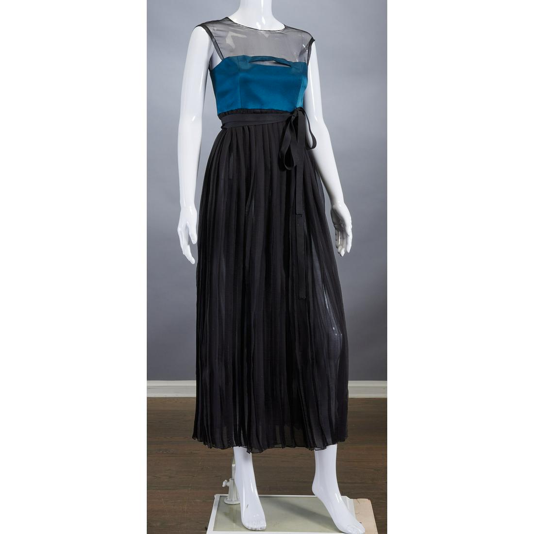 Geoffrey Beene chiffon and satin evening dress: Geoffrey Beene chiffon and satin evening dress, c. 1990's, sheer black top with teal satin inset, long pleated skirt, keyhole back, approx. 32"b, 52"l Provenance: From a private Manhattan collection