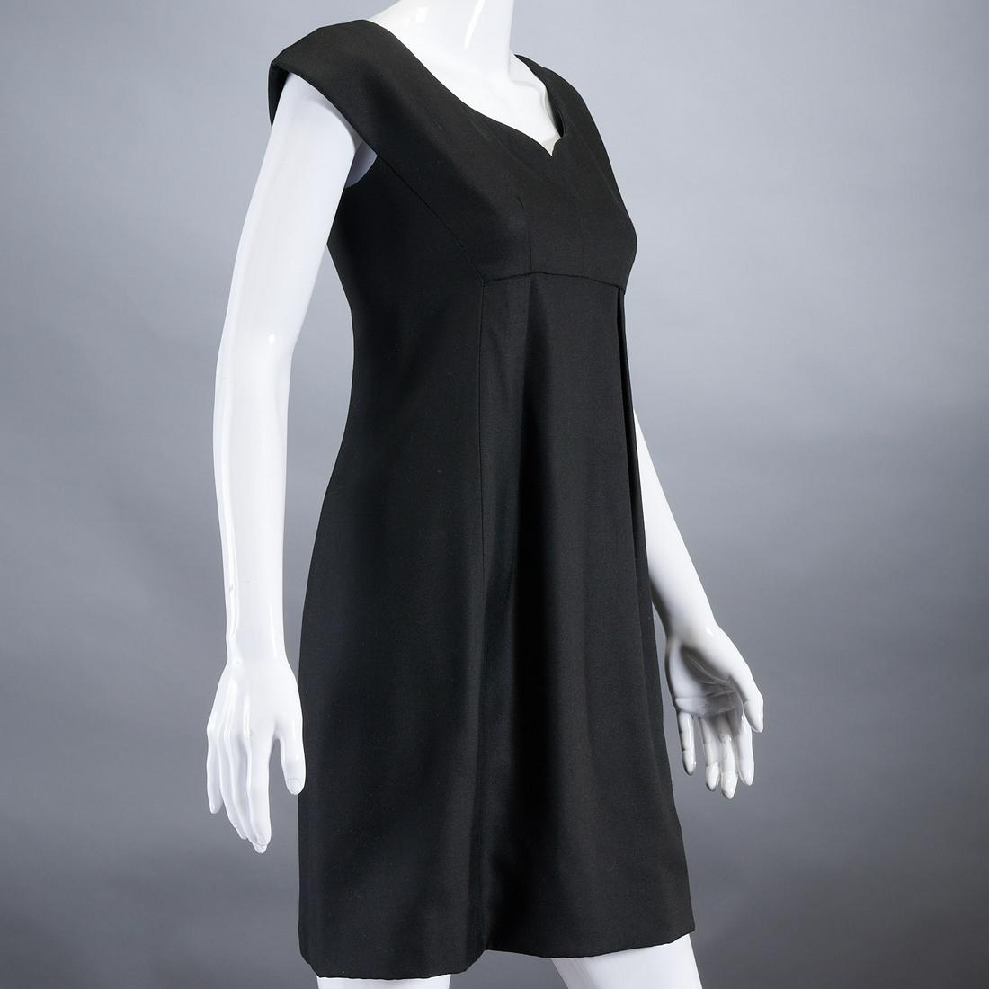 Geoffrey Beene "little black dress": Geoffrey Beene "little black dress", c. 1990's, cap sleeve with sweetheart bust line, fully lined with front pleating, zip back, approx. 34"b, 30"w, 35"l Provenance: From a private Manhattan collectio