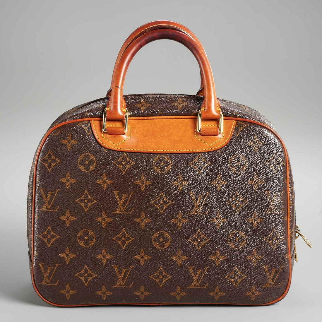 Louis Vuitton monogram canvas Deauville handbag: Louis Vuitton monogram canvas Deauville handbag, 20th c., satchel style (2) handle tote with full exterior pocket, cowhide rolled leather trim & handles, wrap zipper, interior with patch pockets, stam