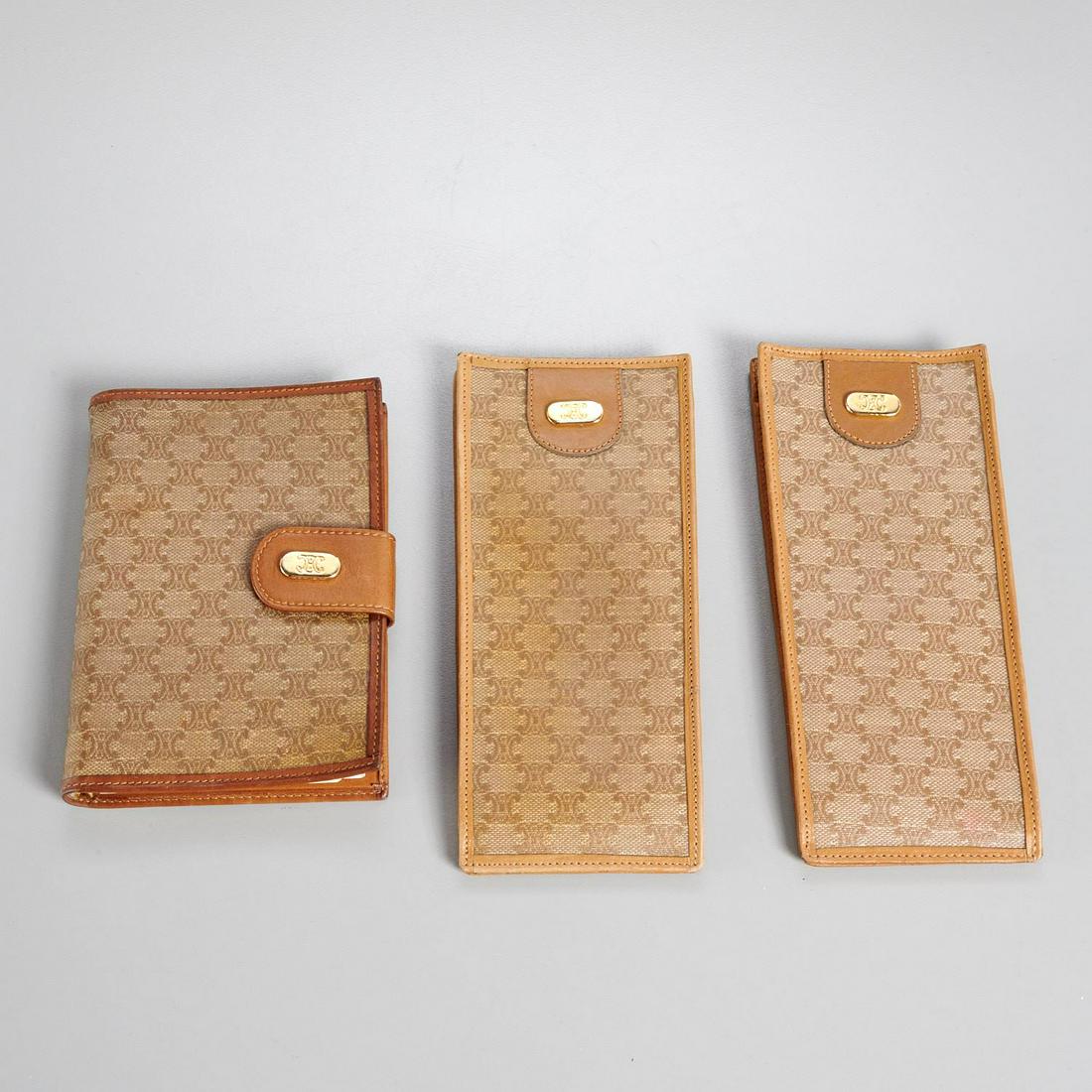 Group of Celine leather accessories: Group of Celine leather accessories, c. 1980's, all in canvas logo print, incl. (1) address bi-fold book, 5.5"h x 3.5"w, (2) eyeglass cases, 7"h x 3"w