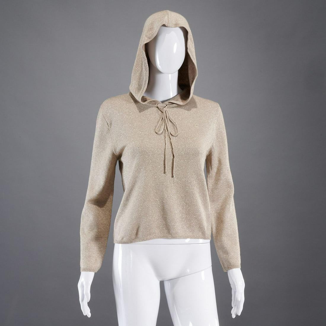 Chanel Boutique silver metallic hoodie: Chanel Boutique silver metallic hoodie, 20th c., wool/cashmere/silk, drawstring neck, metal CC logo, no size tag, XS-S, approx. 36"b, 21"sl, 20"l Provenance: From a New Canaan, CT single owner clothin