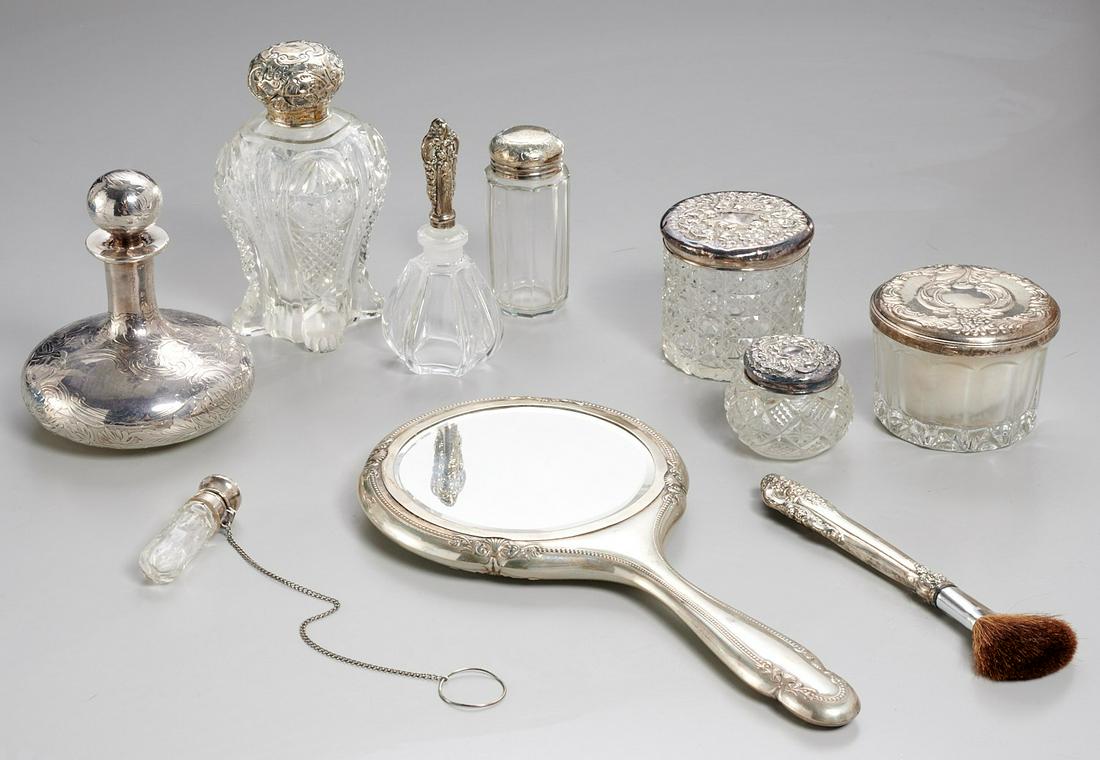Collection silver and glass vanity objects: Collection silver and glass vanity objects, 19th/20th c., (10) pieces incl. perfume decanters, dresser jars, a make up brush, purse perfume vial, and hand mirror, some marked sterling, others silver c