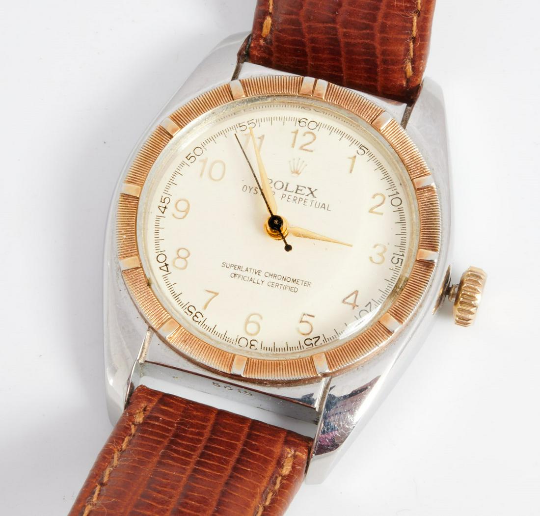 Rolex Oyster Perpetual watch: Rolex Oyster Perpetual watch, c. 1950's, with stainless steel case, Arabic numerals to face, approx. 1.25" across