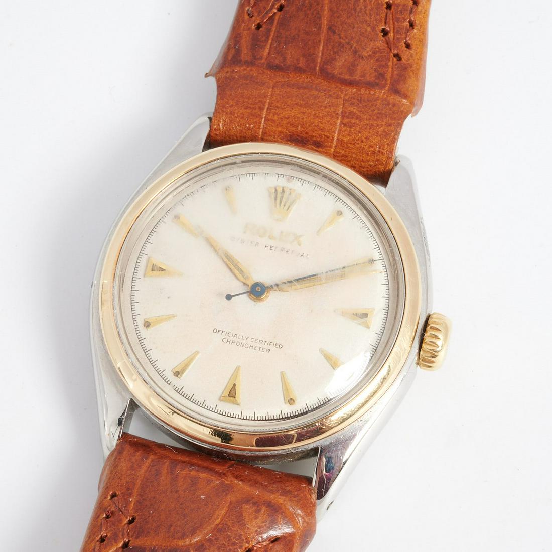 Rolex Oyster Speedking perpetual watch: Rolex Oyster Speedking perpetual watch, c. 1950's, with super Speedking crown, dial marked Oyster Perpetual, Officially Certified Chronometer, Two Tone 14k Yellow Gold Bezel with Stainless Steel Case,