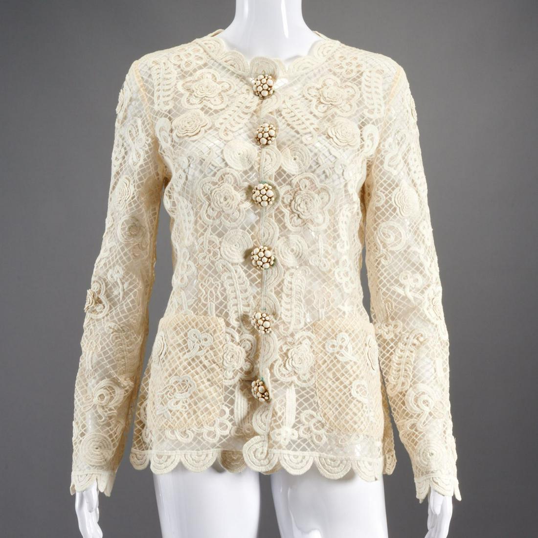 Oscar de la Renta floral embroidered lace jacket: Oscar de la Renta floral embroidered lace jacket, 2013 Spring Collection, ivory tulle, cabochon encrusted button front, size 6, approx. 35"b, 16"sh, 25"sl, 24"l Provenance: From a private Manhattan co