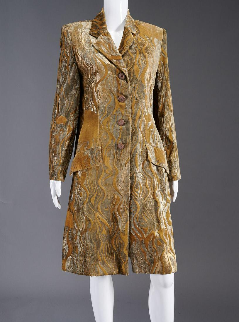 Bill Blass stenciled velvet coat: Bill Blass stenciled velvet coat, c. 1980's, retailed at Saks Fifth Avenue, taupe with silver pattern, flap pockets, fully lined in silk, size 10, approx. 40"b, 24"sl, 16"sh, 41"l Provenance: From a p