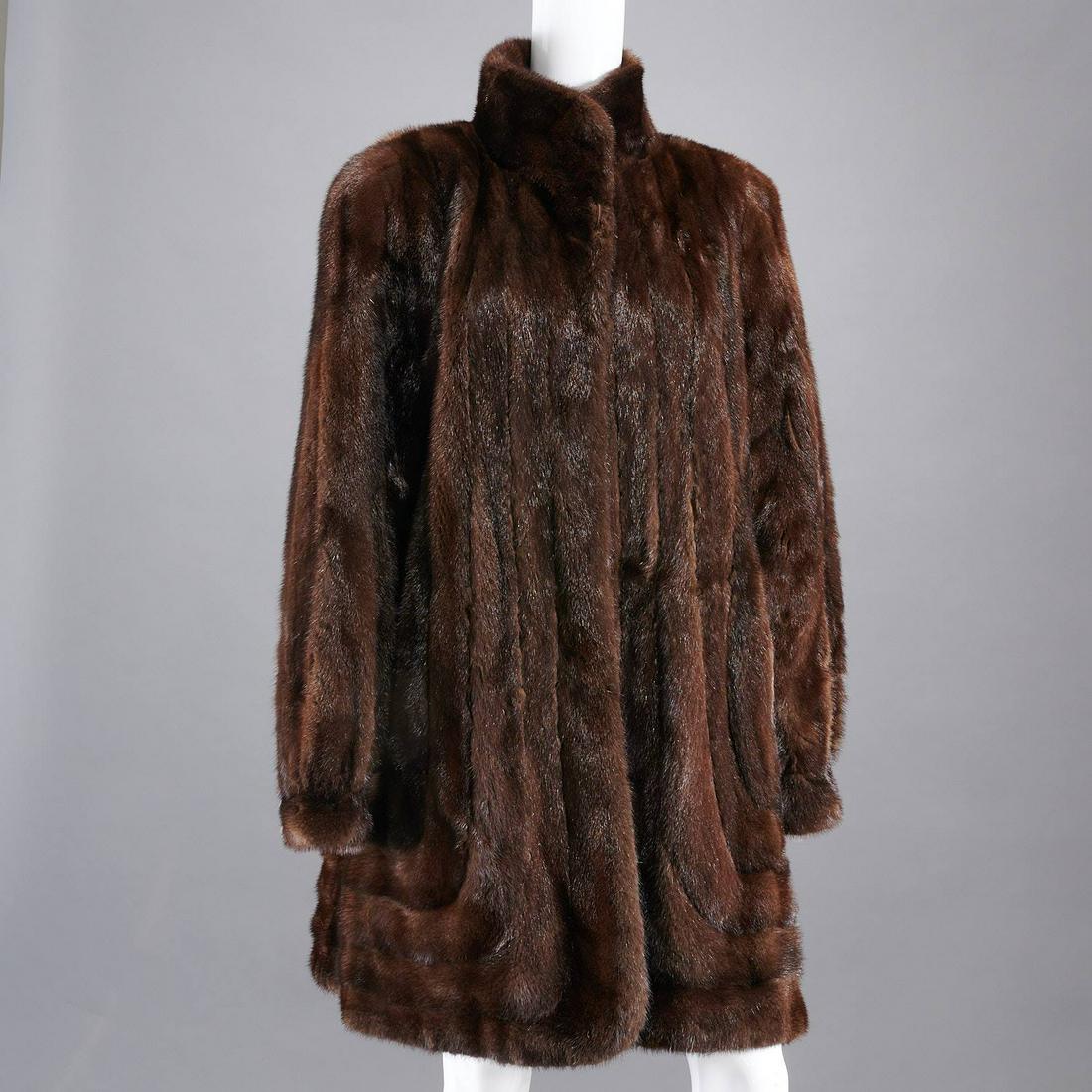 Mary McFadden mahogany mink 3/4 coat: Mary McFadden mahogany mink 3/4 coat, c. 1990's, with Maximillian at Bloomingdale's label, no size tag, appears to be L, approx. 44"b, 19"sh, 26"sl, 38"l