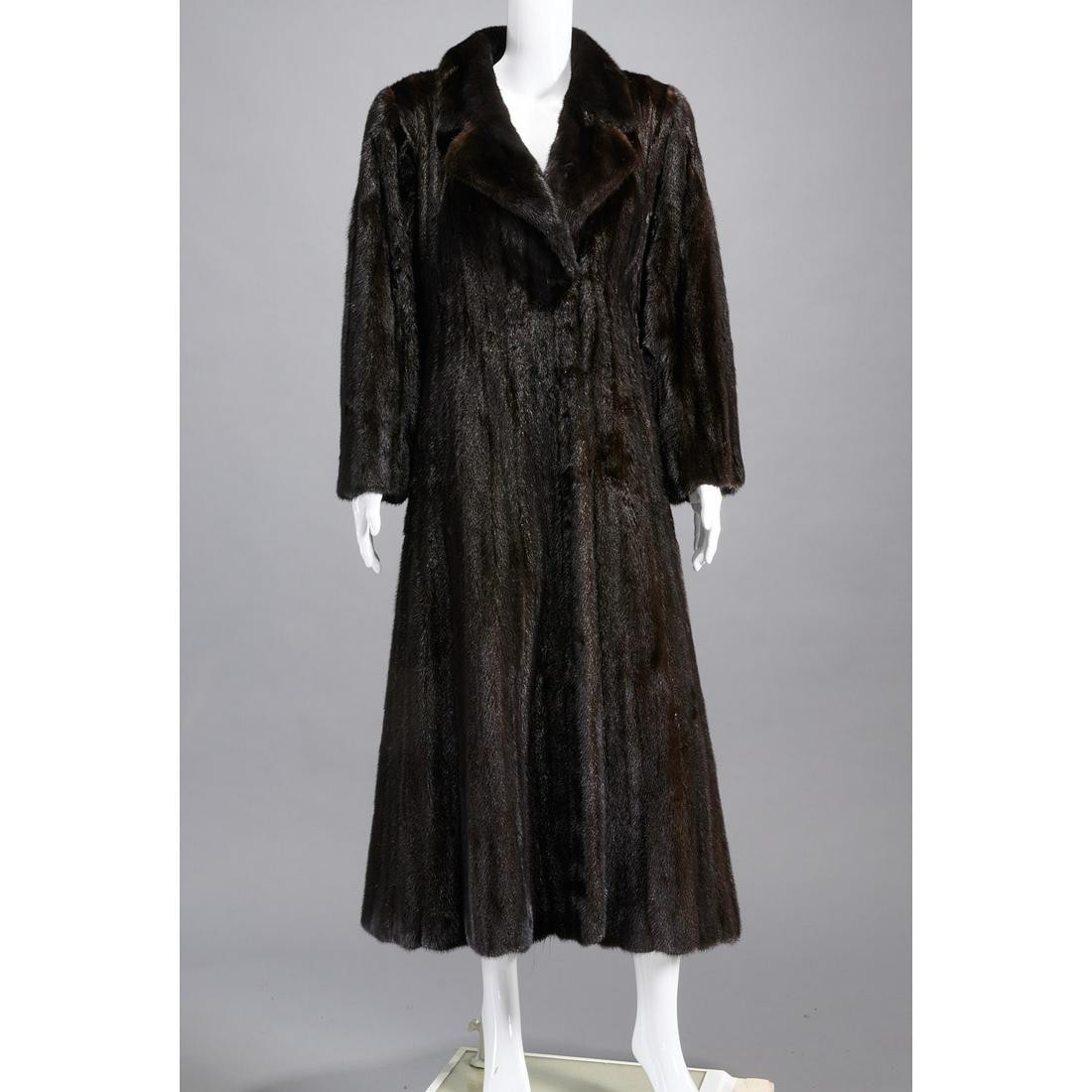 Pierre Balmain dark ranch mink long coat: Pierre Balmain dark ranch mink long coat, c. 1980's/90's, Blackgama fur, notched collar, hook and eye closure, with "Pierre Balmain" silk lining, embroidered monogram MDDM, approx. 38"b, 17"sh, 24"sl,