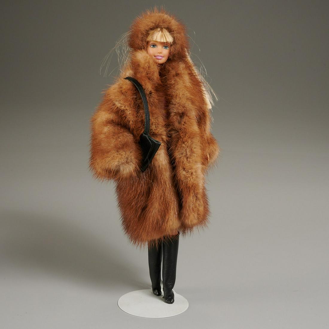 Barbie with bespoke fur coat & headband: Barbie with bespoke fur coat & headband, 21st c., in pink mini dress with go go boots, styled haircut, open style brown mink coat and matching headband, approx. 12"h