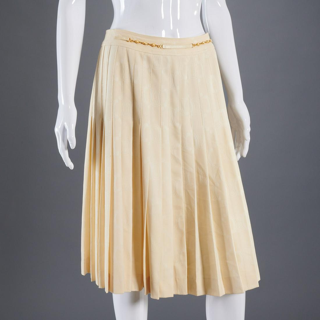 Celine France mid length pleated skirt: Celine France mid length pleated skirt, 21st c., wool jacquard, a-line silhouette with hook & eye closure, with leather & chain attached belt, Made in France, fully lined, orig. retail $3750, size 42