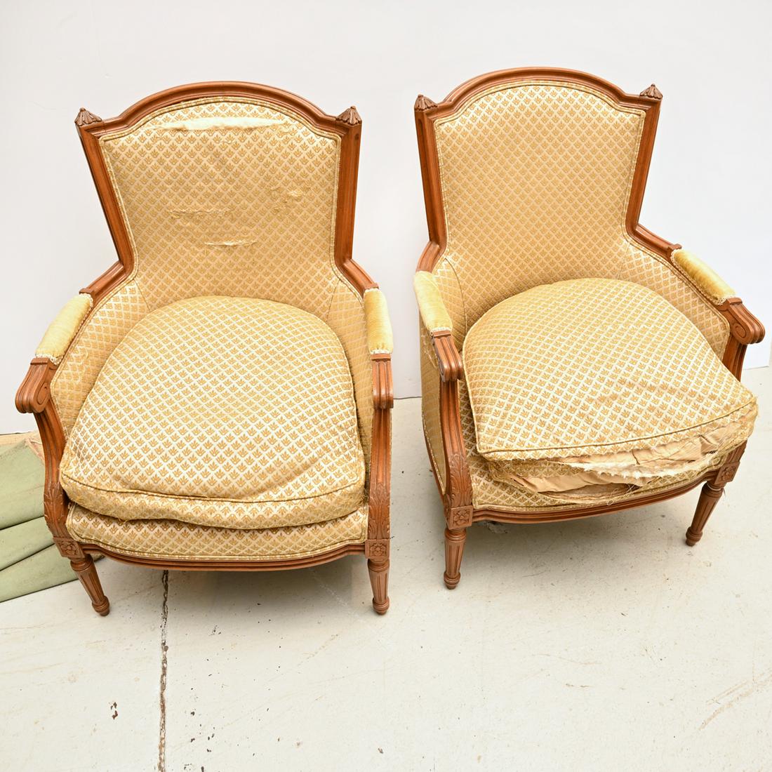 Pair Louis XVI style fruitwood bergeres: Pair Louis XVI style fruitwood bergeres, 20th c., with upholstered seats, backs, and arms, on fluted legs, unmarked, 38"h x 26"w x 24"d