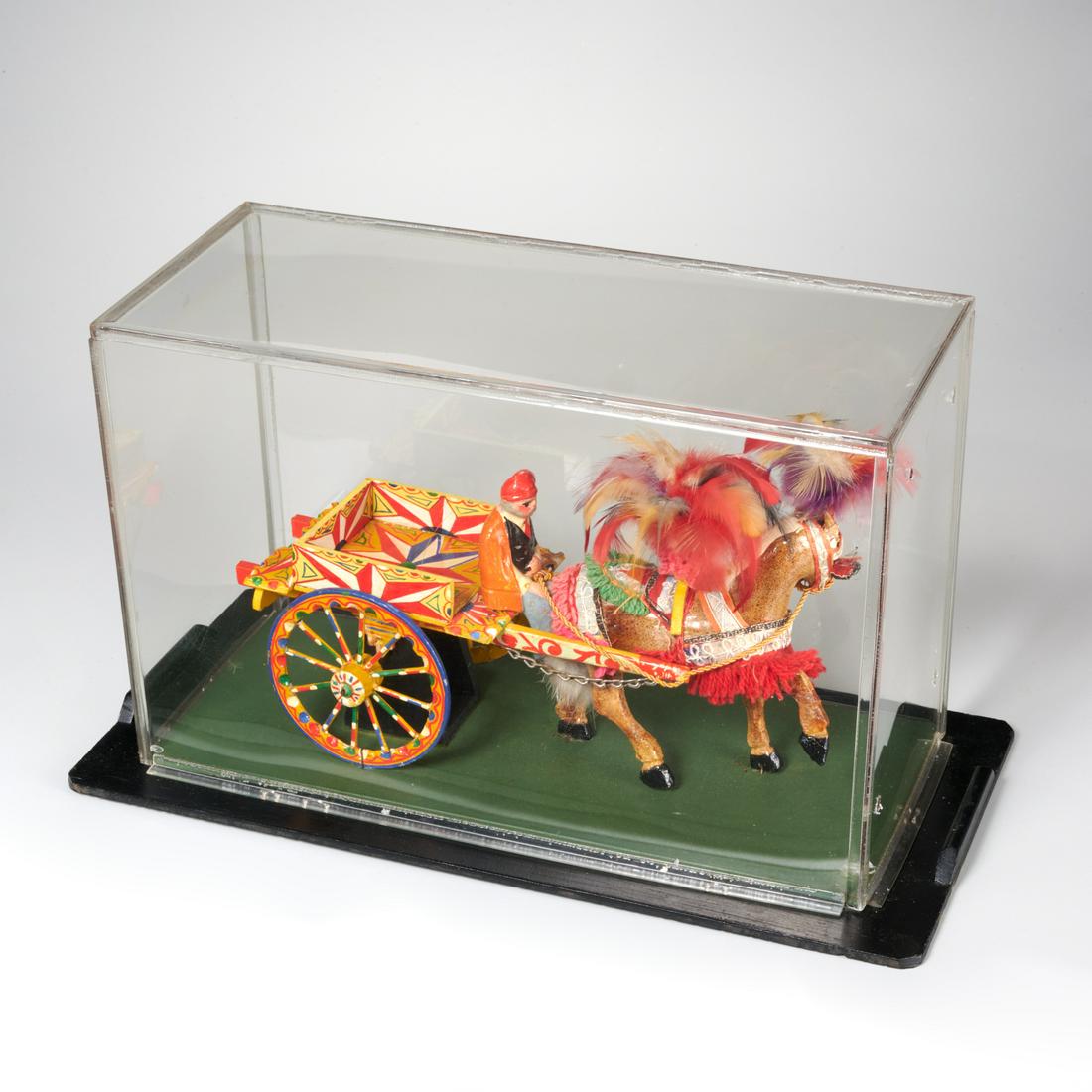 Sicilian folk art cart and horse model, ex-museum: Sicilian folk art cart and horse model, ex-museum, 20th c., wood, plaster, feathers and other materials, highly decorated and detailed model of a traditional folk cart and horse, in plastic display ca