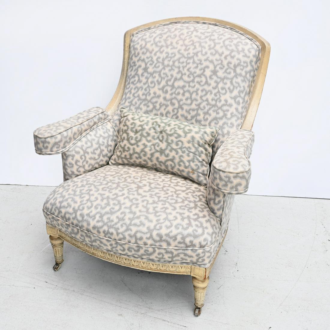 Louis XVI style upholstered bergere: Louis XVI style upholstered bergere, 20th c., pebbled cream lacquered frame, on fluted legs, ending on casters, unmarked, 37"h x 35"w x 35"d