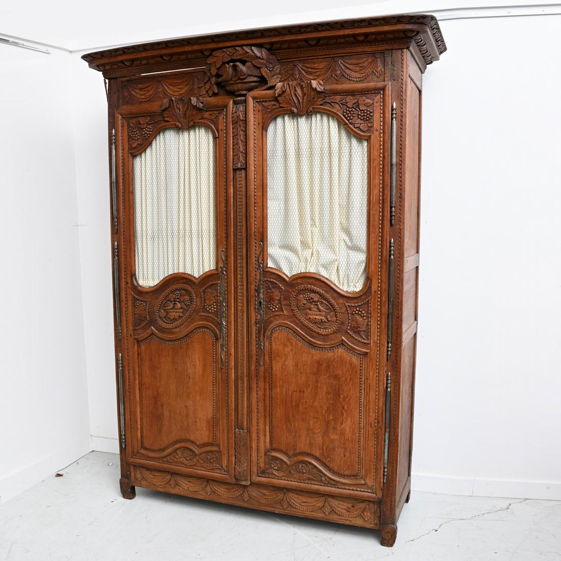 Nice French antique carved walnut armoire (1 of 5)