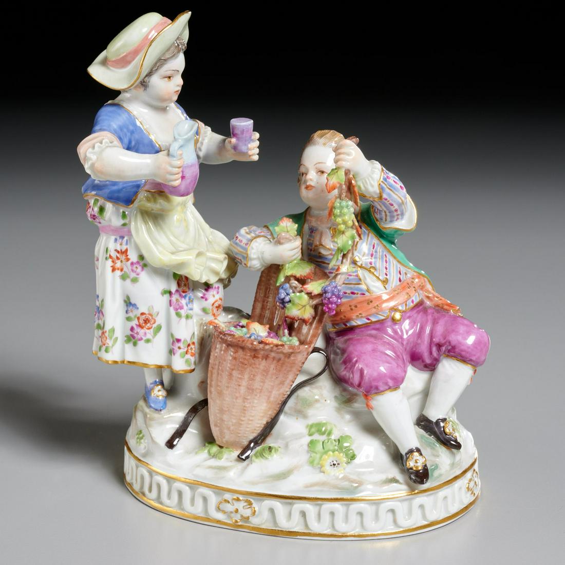 Meissen figural group: Meissen figural group, Late 19th c., couple enjoying a basket of grapes, hand painted porcelain, factory marks to underside, 6.5"h x 5"w Provenance: Property of a New York City Collector