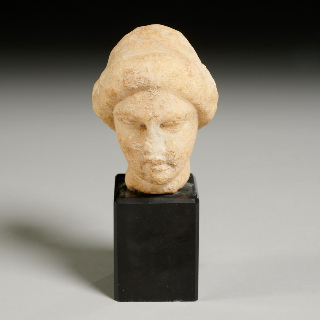 Ancient Greek carved marble female head fragment (1 of 3)