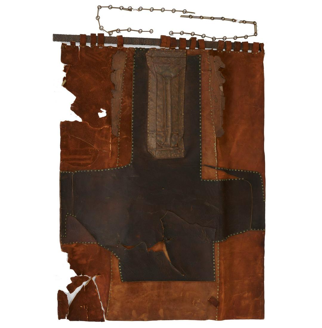 Nancy Grossman (manner), metal, leather collage: Nancy Grossman (manner), metal, leather collage, Manner of Nancy Grossman (American, b. 1940), brass riveted patchwork leather and sheet metal, one leather piece stamped "DT", on modernist cast iron h