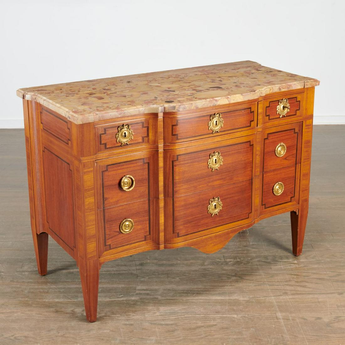 Louis XVI Transition style commode, ex Doris Duke: Louis XVI Transition style commode, ex Doris Duke, 19th/20th c., France, shaped breche d'alep marble top over mahogany veneered case with ebony thread inlay, gilt bronze pulls, raised on square taperi