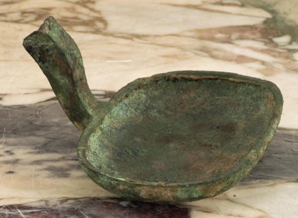 Chinese patinated bronze ladle fragment: Chinese patinated bronze ladle fragment, Probably Han Dynasty, 2.25"h x 4.25"w x 4.5"d Provenance: The Doris Duke Charitable Foundation