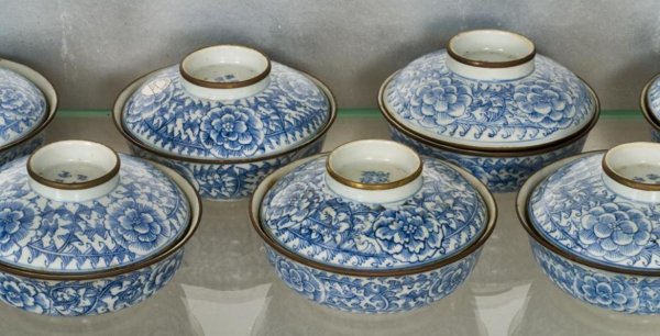 Set (11) antique Chinese Thai market blue-and-white: Set (11) antique Chinese Thai market blue-and-white bowls and covers, 19th Century, each with peony blossom and foliate scroll decoration, 4-character marks on underside of foot, 3"h x 5.5"dia. (total