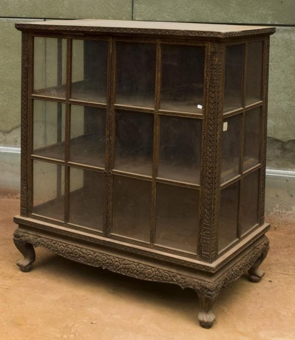 Antique Thai carved giltwood and red lacquer cabin: Antique Thai carved giltwood and red lacquer cabinet, 19th Century, the slightly tapered glazed panel case fitted with 2 doors on claw-and-ball feet, 49.5"h x 42.5"w x 23.25"d Provenance: The Doris Du