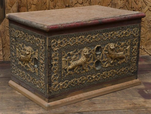 Antique Burmese giltwood and mirror tiled scriptur: Antique Burmese giltwood and mirror tiled scripture chest, 19th Century, rectangular in shape decorated with rampant lions and scrolling foliage in relief, 25"h x 39.5"l x 24.75"d Provenance: The Dori