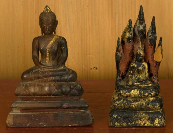 (2) antique Southeast Asian giltwood Buddhas: (2) antique Southeast Asian giltwood Buddhas, 19th Century, probably Thai, larger: 6.5"h x 4.5"w x 2.25"d, smaller: 6.5"h x 3"w x 2"d Provenance: The Doris Duke Foundation