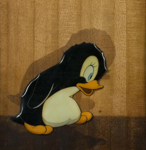 Disney animation cel from "Donald's Penguin": Disney animation cel from "Donald's Penguin", Tootsie, on painted wood background, 6" x 5.75" (sight), matted and framed Provenance: The Doris Duke Charitable Foundation, Courvoisier Galleries, San Fr