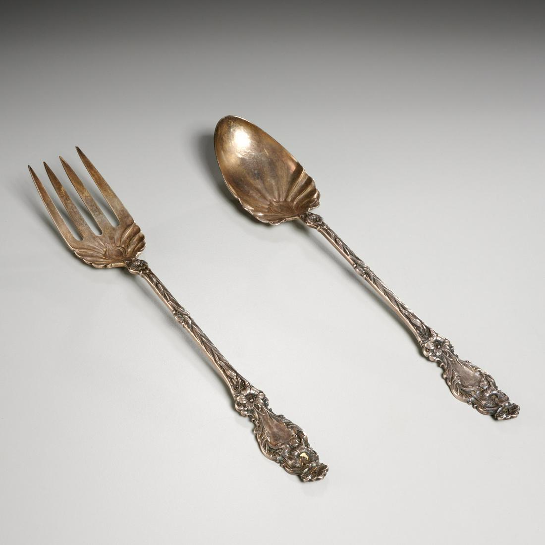 Whiting sterling silver lily salad serving set: Whiting sterling silver lily salad serving set, 20th c., salad serving fork and knife set, in the "Lily" pattern designed in 1902, stamped "Sterling" with maker's mark, 11.5"l, approx. 9.4ozt