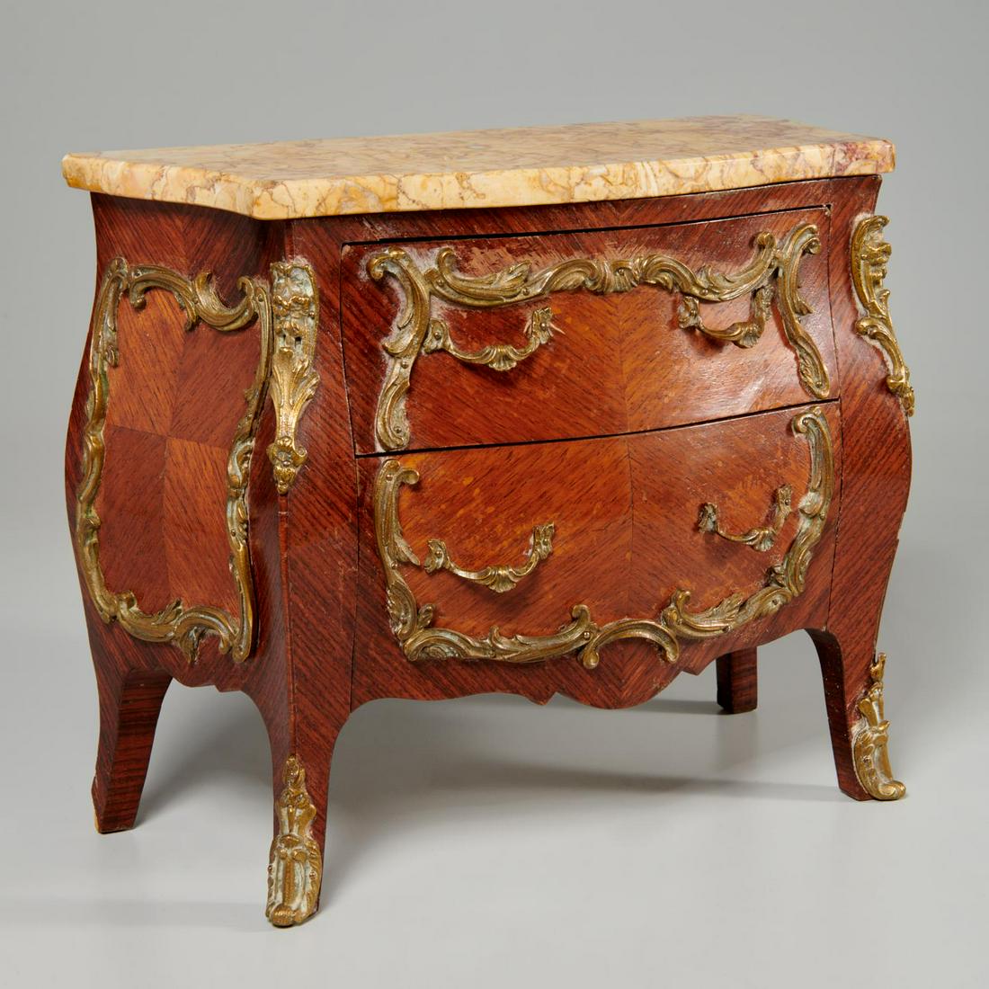 Louis XV style miniature marble top commode: Louis XV style miniature marble top commode, 19th/20th c., mahogany veneered two-drawer commode, with gilt metal mounts and hardware, 10.25"h x 12"w x 5.75"d