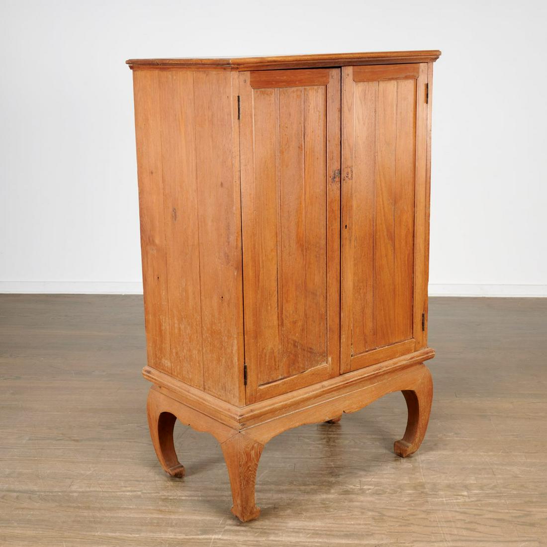 Antique Thai hardwood cabinet: Antique Thai hardwood cabinet, Prob. 19th c., two-door cabinet on in-curved feet, approx. 54"h x 33.75"w x 20"d
