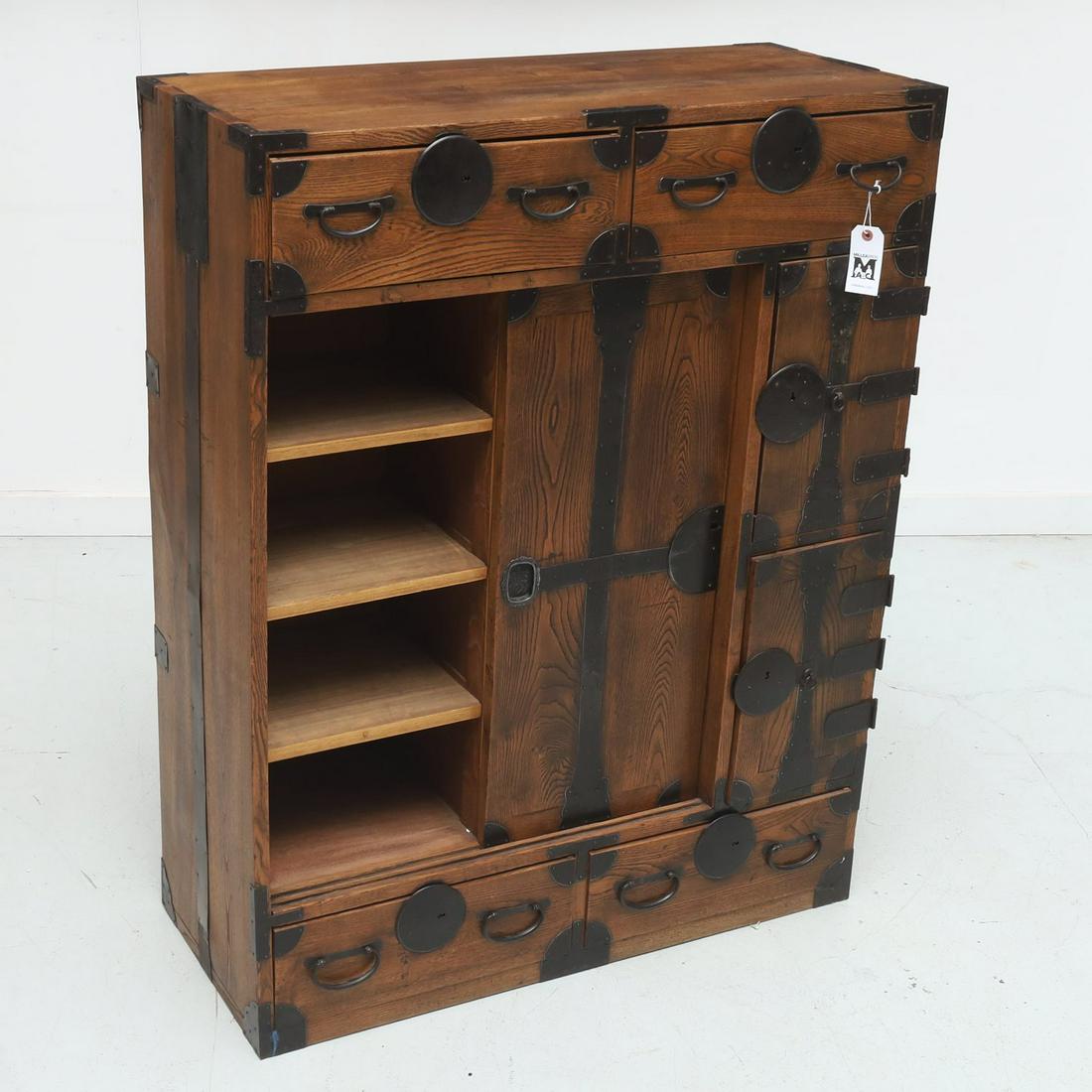 Japanese or Korean wood and iron Tansu chest: Japanese or Korean wood and iron Tansu chest, 20th c., wrought iron pulls, with four drawers, and sliding and hinged doors, 46"h x 36.5"l x 14.5"w