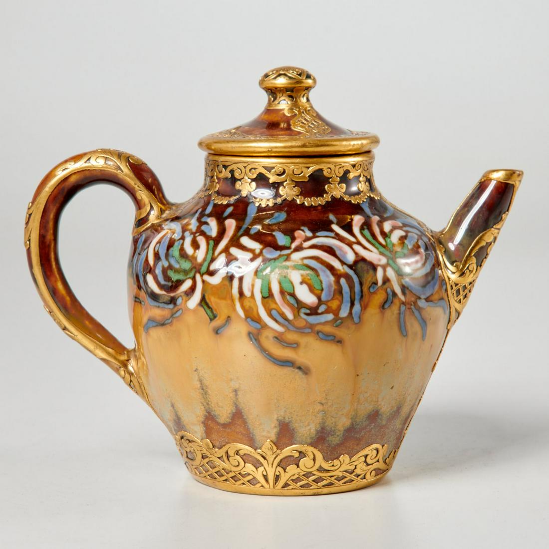 Boch Freres (attrib.) gilt metal, pottery teapot: Boch Freres (attrib.) gilt metal, pottery teapot, Early 20th c., Belgian, pottery teapot with abstracted floral glazed decoration and gilt overlay, no visible marks, 6.25"h x 7"w x 4.5"d
