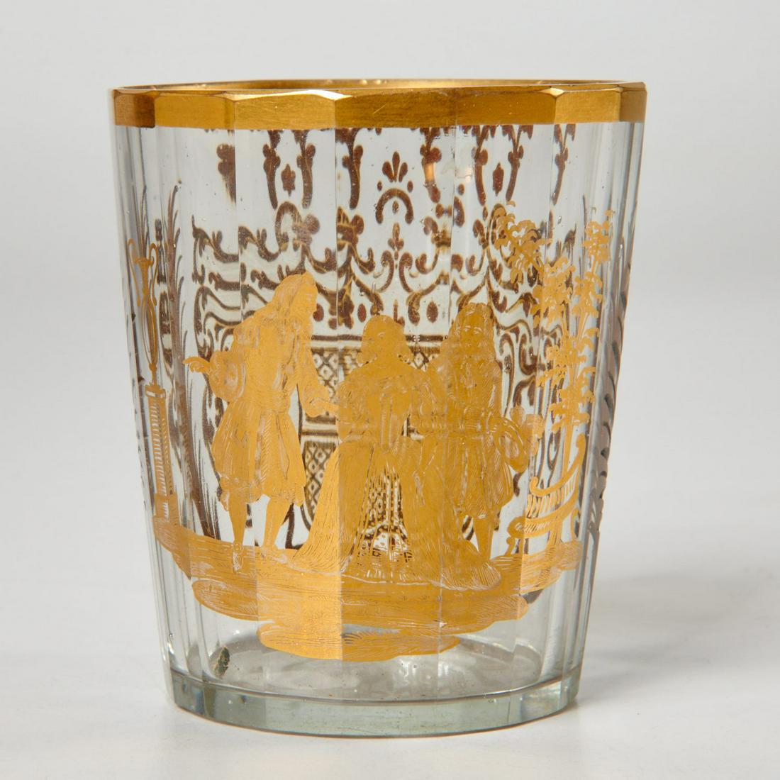 Good Silesian gilt glass beaker with case: Good Silesian gilt glass beaker with case, 19th c., coat of arms decoration with classical figures, with leather travel case; together with a hinged embossed leather chalice case, 9.5"h x 6.25"w x 4.5