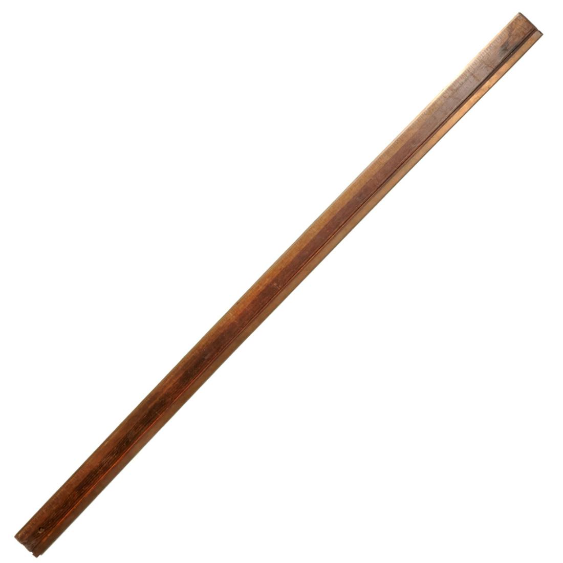 Antique wood and brass 6-foot rigid ruler: Antique wood and brass 6-foot rigid ruler, Likely early 20th c., American, brass-bound edges, stamped with quarter-inch increments and feet, indistinct manufacturer's mark, possibly "RIDGIN", hanging 