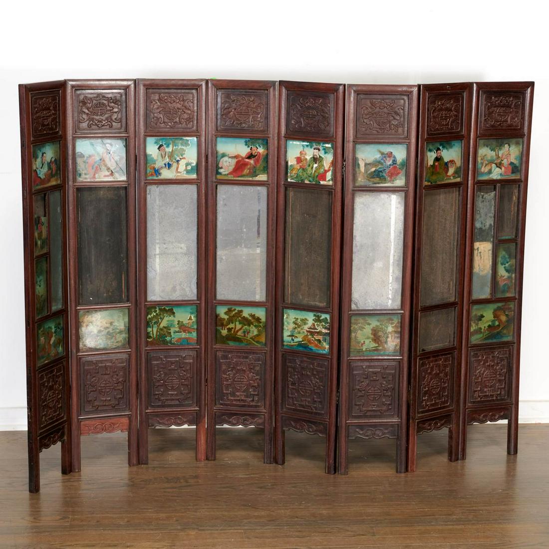 Chinese glass inset hardwood table screen: Chinese glass inset hardwood table screen, 19th c., (8) panels, each carved hardwood panel with inset mirrors and eglomise panels, flanked above and below by sections carved in low relief with bats su