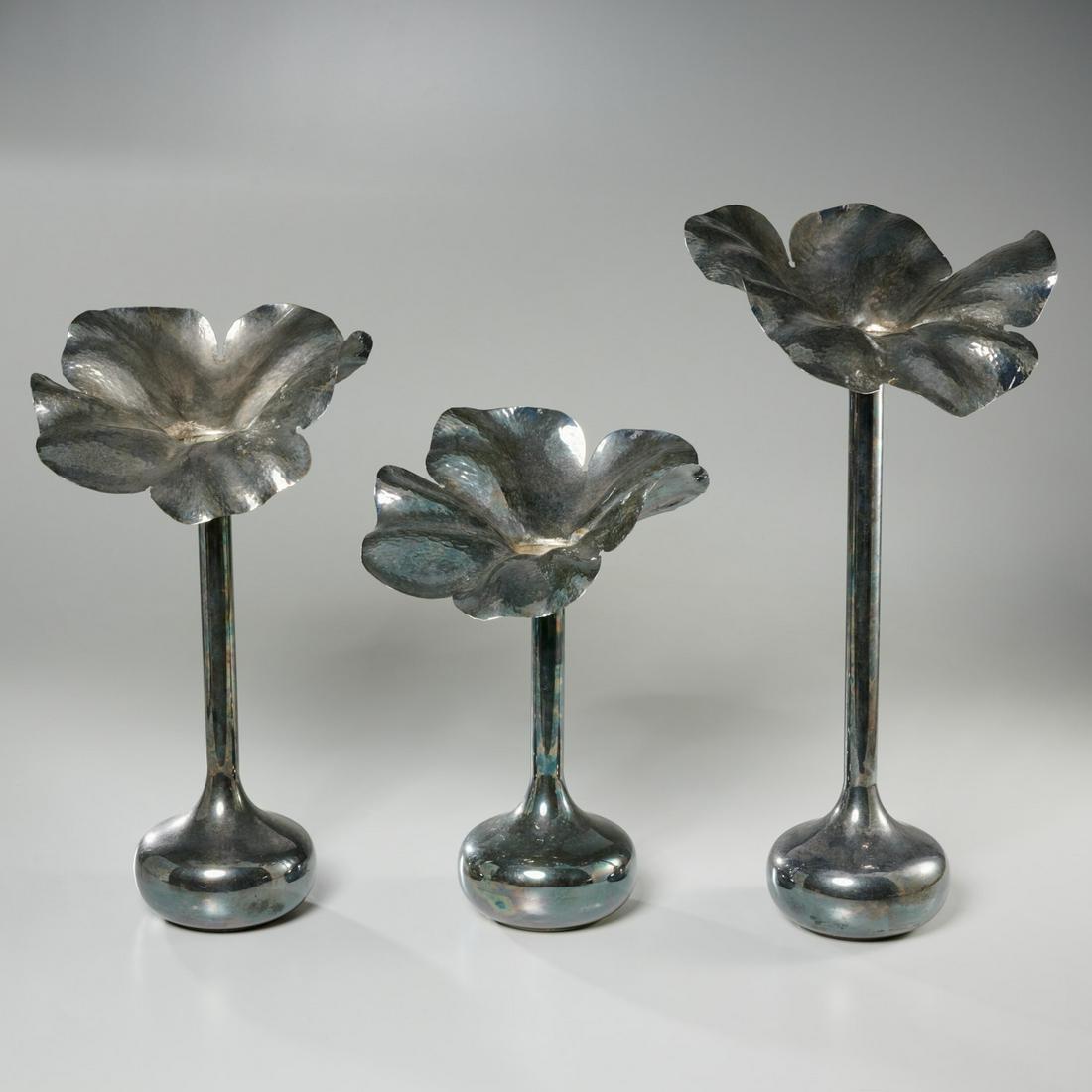 Set (3) Baullar silver plated petal vases: Set (3) Baullar silver plated petal vases, 20th c., silver plated hammered metal vases, in flower form, each signed on underside of foot, 18.5"h x 9"w (largest), 13"h x 8.25"w (smallest)